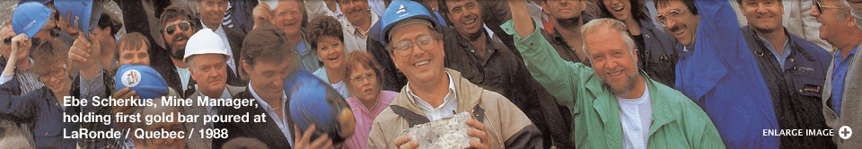 Ebe Scherkus, Mine Manager, holding first gold bar poured at LaRonde / Quebec / 1988