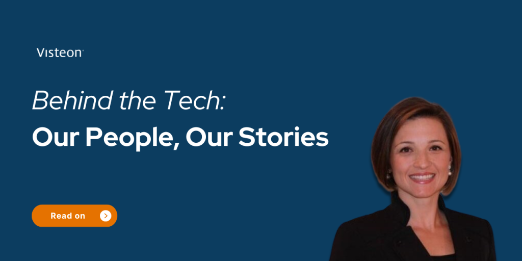 a woman smiling with a blue background