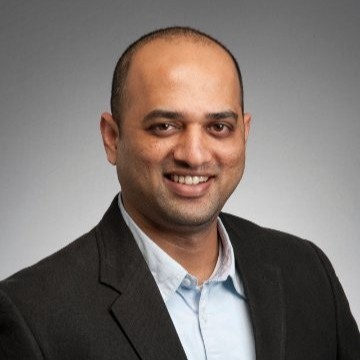 a man smiling for the camera